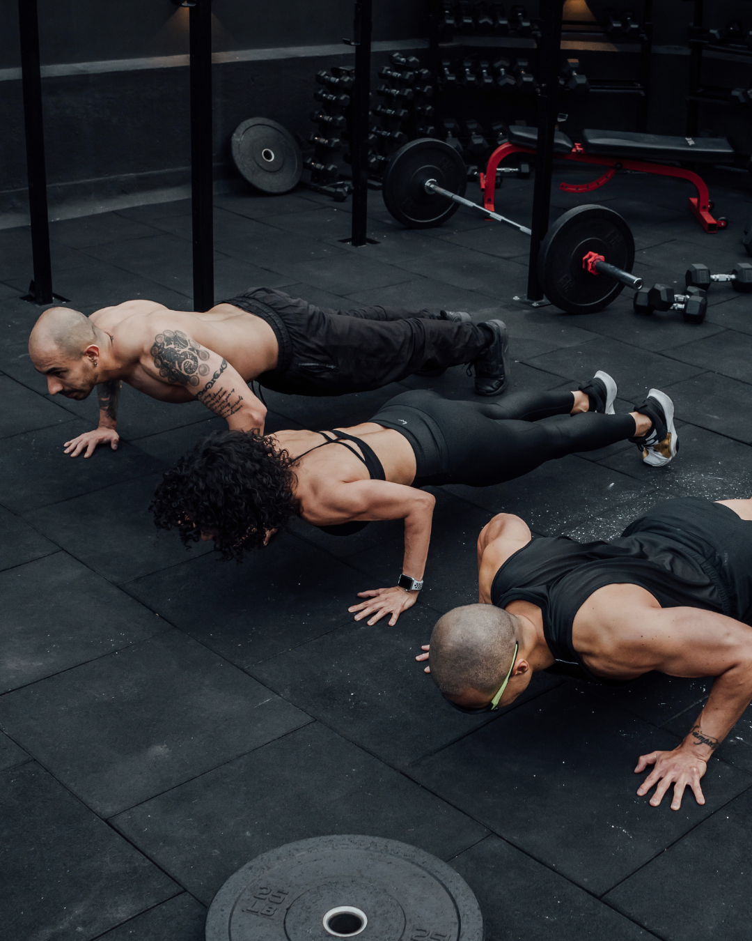 Three people exercising together